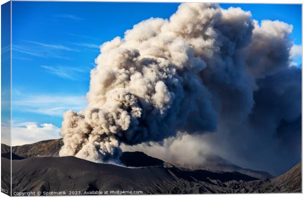 Erupting smoke and ash from Mount Bromo summit  Canvas Print by Spotmatik 