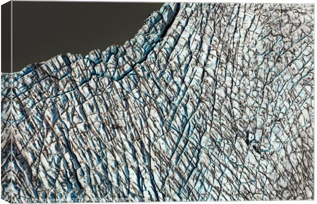 Aerial view ice crevasses frozen glacier Alaska USA Canvas Print by Spotmatik 
