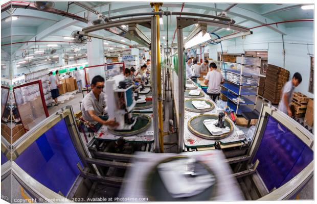 Chinese workers assembling and producing PCBs China Asia Canvas Print by Spotmatik 