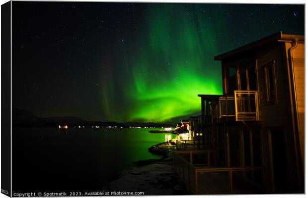 Aurora Borealis in night sky Arctic Circle Norway Canvas Print by Spotmatik 