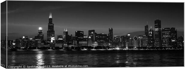 Panorama of Chicago city skyscrapers illuminated at dusk Canvas Print by Spotmatik 