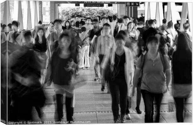 Asian city commuters walking to work Hong Kong Canvas Print by Spotmatik 