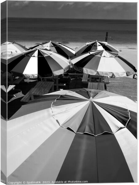 Colorful beach umbrellas in the tropical sunshine Caribbean Canvas Print by Spotmatik 