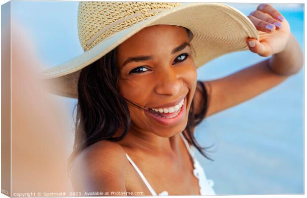 Portrait of smiling African American girl wearing hat Canvas Print by Spotmatik 