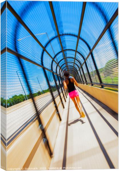 Young Afro American woman running through covered walkway Canvas Print by Spotmatik 