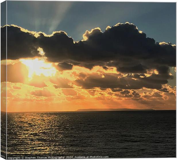 Lundy Island sunset seen from Woolacombe Canvas Print by Stephen Thomas Photography 