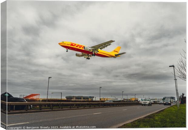 DHL Cargo Canvas Print by Benjamin Brewty