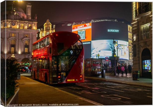 Red London Bus At Piccadilly Circus Canvas Print by Benjamin Brewty