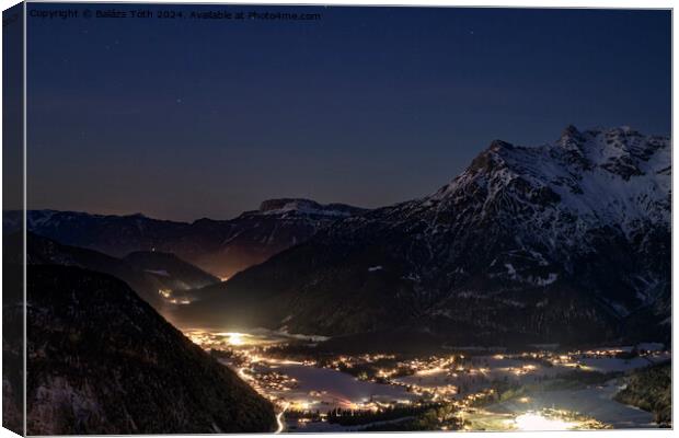 The town and the mountains at night Canvas Print by Balázs Tóth