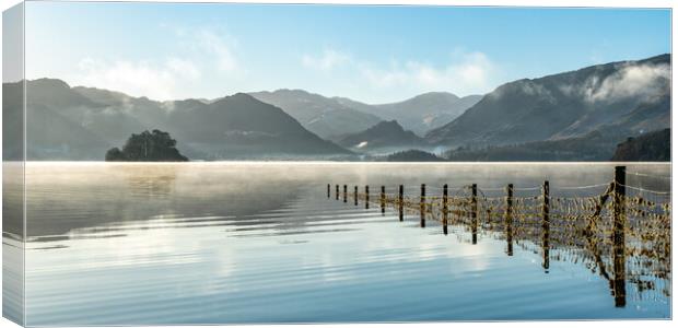 Misty Derwent water with Borrowdale in the Distance Canvas Print by Julian Carnell