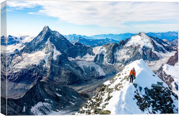 Alpine climbers on a mountain Canvas Print by Julian Carnell