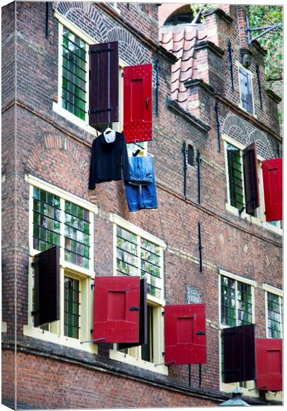 Clothes hanging from a window in Kattengat, Amsterdam, Holland,  Canvas Print by Fabrizio Troiani