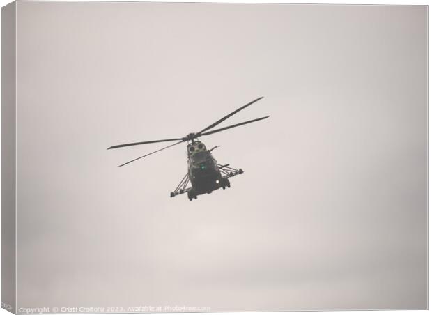 Military helicopter Canvas Print by Cristi Croitoru