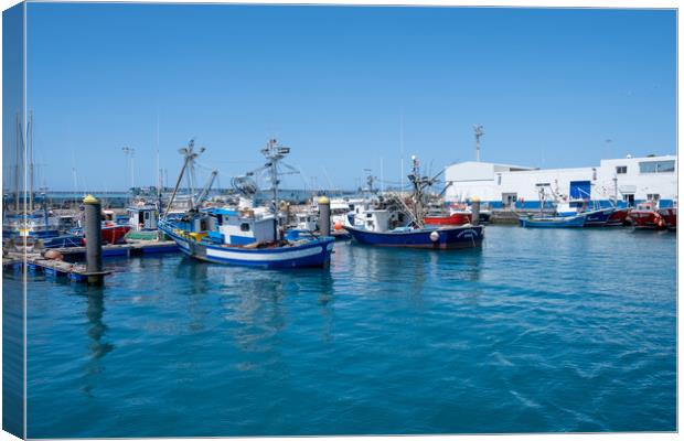 Los Cristianos Harbour: A Vibrant Seaside Haven. Canvas Print by Steve Smith