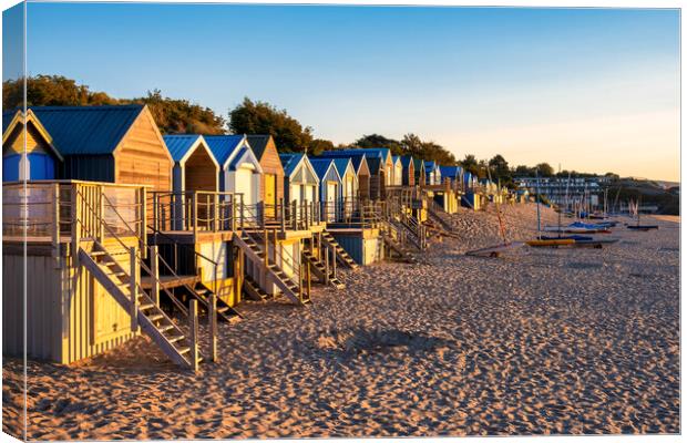 Quirky Wooden Beach Huts at Sunrise Canvas Print by Tim Hill