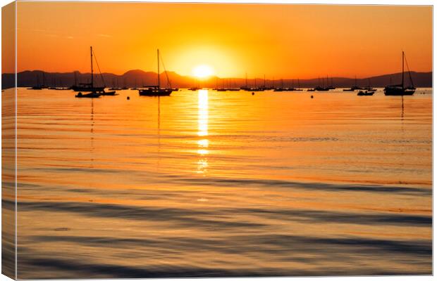 Sunrise happens over Abersoch Bay Canvas Print by Tim Hill