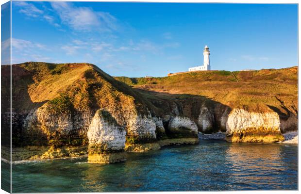 Flamborough sea stack and Lighthouse Canvas Print by Tim Hill