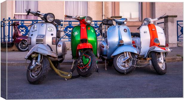 Vespa and Lambretta scooters at Whitby Canvas Print by Tim Hill