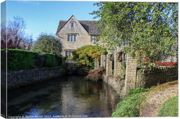 A secluded cottage in Bourton on the water Canvas Print by Martin fenton