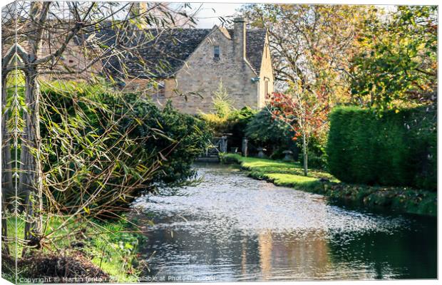 Bourton on the water river Canvas Print by Martin fenton