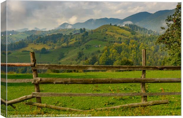 Rural idyllic landscape in Transylvania, Romania, with grassy fi Canvas Print by Arthur Mustafa