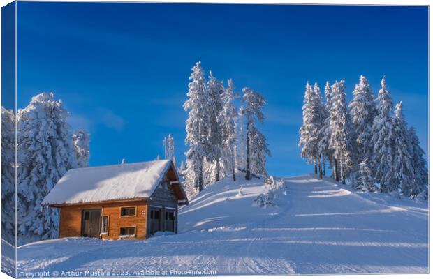Winter wonderland in the Alps, frozen spruce trees and a cottage Canvas Print by Arthur Mustafa