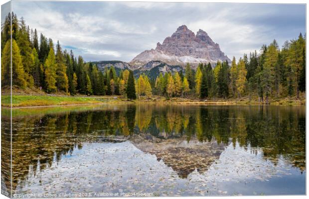 Tre Cime di Lavaredo peaks and Lake Antorno with sky reflection  Canvas Print by Lubos Chlubny