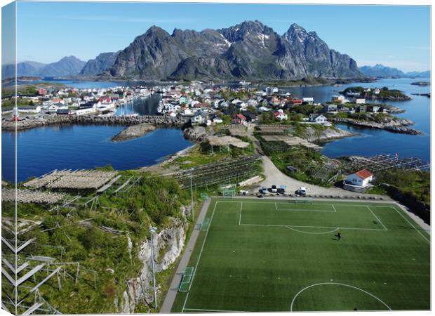 Aerial view of fishing village and football field on Lofoten Islands in Norway Canvas Print by Irena Chlubna