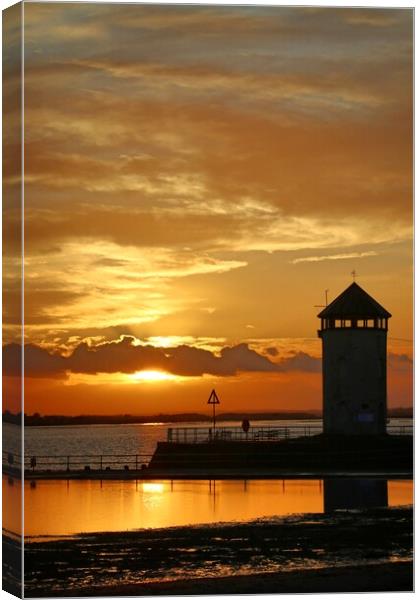 Sunset over the Batemans Tower in Brightlingsea essex at sunset  Canvas Print by Tony lopez