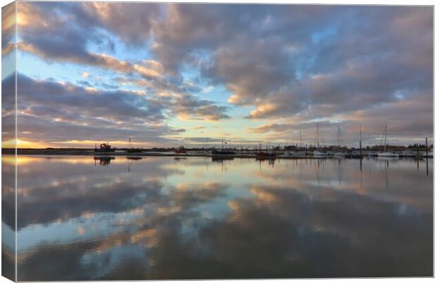 Brightlingsea Harbour reflections  Canvas Print by Tony lopez