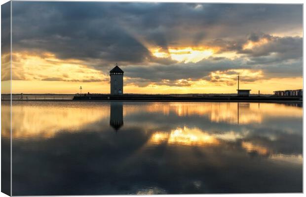 Sunset colours and reflections over Brightlingsea tidal pool  Canvas Print by Tony lopez