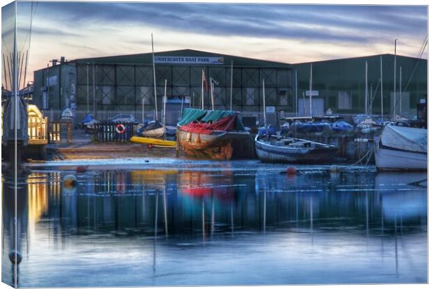 Early morning calm over the Heritage smack Dock in Brightlingsea  Canvas Print by Tony lopez