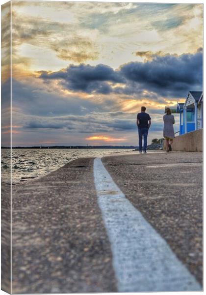 Walking into the  sunset colours across the river Colne In  Brightlingsea.  Canvas Print by Tony lopez
