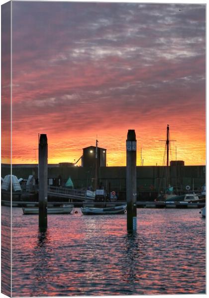Sunrise colours over the Brightlingsea Harbour  Canvas Print by Tony lopez