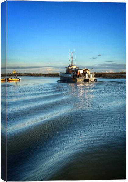 Comming home in the afternoon sun into Brightlingsea Harbour.  Canvas Print by Tony lopez