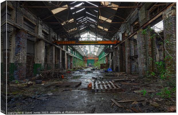 Abandoned warehouse with overhead crane Canvas Print by David Jones