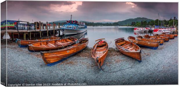 Scenic Tourist Rowing Boats on Lake Windermere's A Canvas Print by Gordon Elias