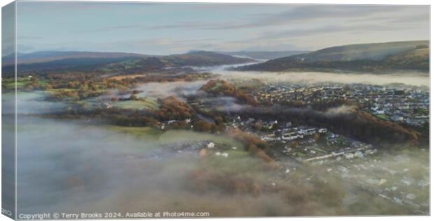 Aerial View over A Fog Filled Ystradgynlais Canvas Print by Terry Brooks