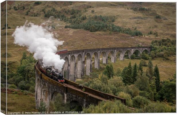 TheJacobite crossing Glenfinnan Viaduct Canvas Print by Pete Mainey