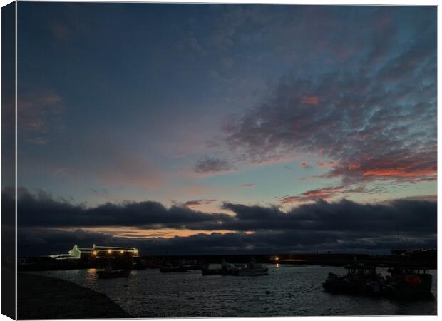 Lyme Regis Cobb sunset Canvas Print by Charles Powell