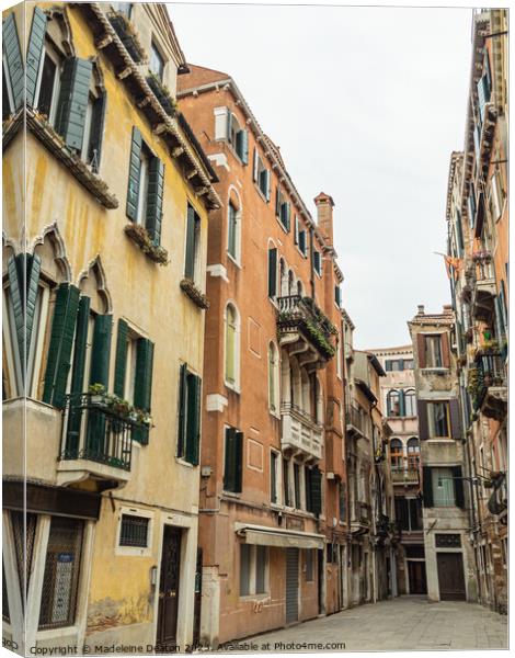 Empty Pastel Colored Venetian Street During Winter Canvas Print by Madeleine Deaton