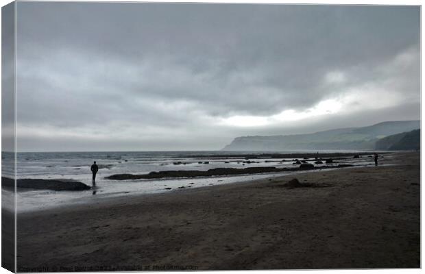 Beach with storm clouds, Robin Hood’s Bay Canvas Print by Paul Boizot