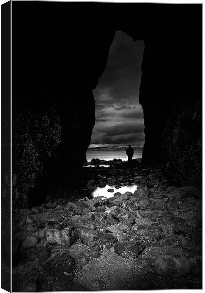 Lydstep cavern,Tenby in Black and White Canvas Print by Simon Gladwin
