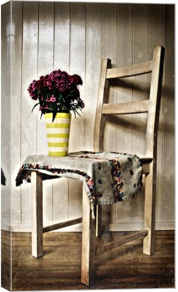 Chair and Flowers Canvas Print by Simon Gladwin