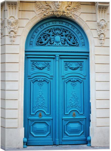 Old fashioned front door entrance, white facade and blue door, Paris, France Canvas Print by Virginija Vaidakaviciene