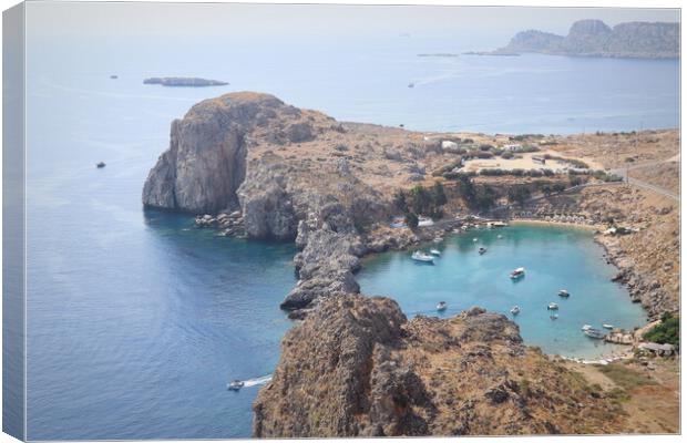 Panoramic view of Saint Pauls Bay in shape of heart from Acropolis of ancient city of Lindos, Rhodes, Greece Canvas Print by Virginija Vaidakaviciene