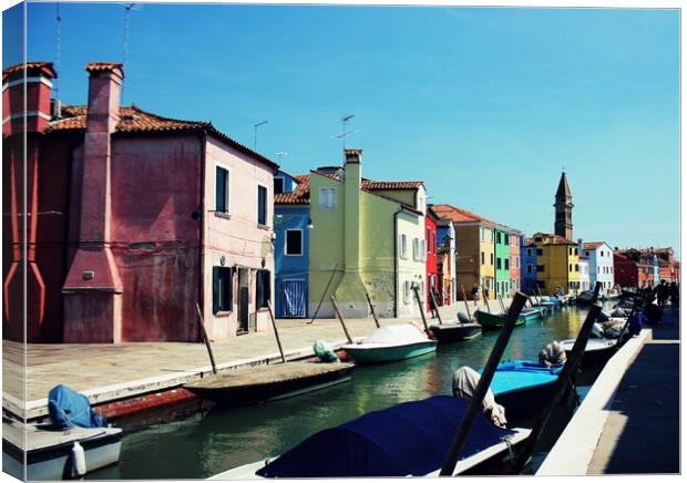Street with colorful buildings in Burano island, Venice, Italy Canvas Print by Virginija Vaidakaviciene