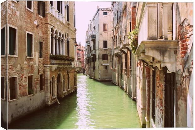 Canal in Venice, Italy. Exquisite buildings along Canals. Canvas Print by Virginija Vaidakaviciene