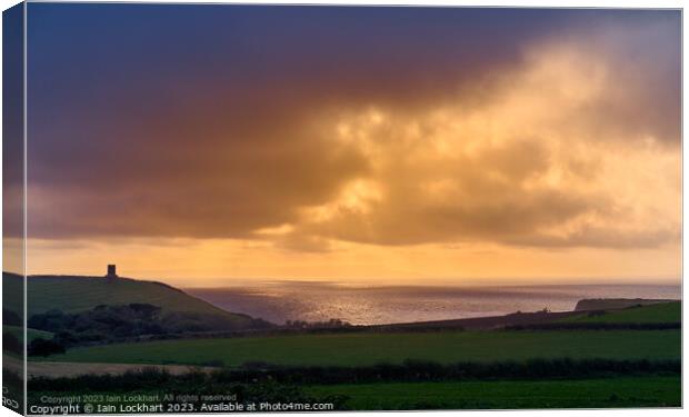 Sunset over Kimmeridge Bay looking out to Portland Canvas Print by Iain Lockhart