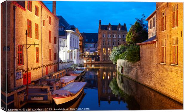Night scene in the City of Bruges in Belgium Canvas Print by Iain Lockhart